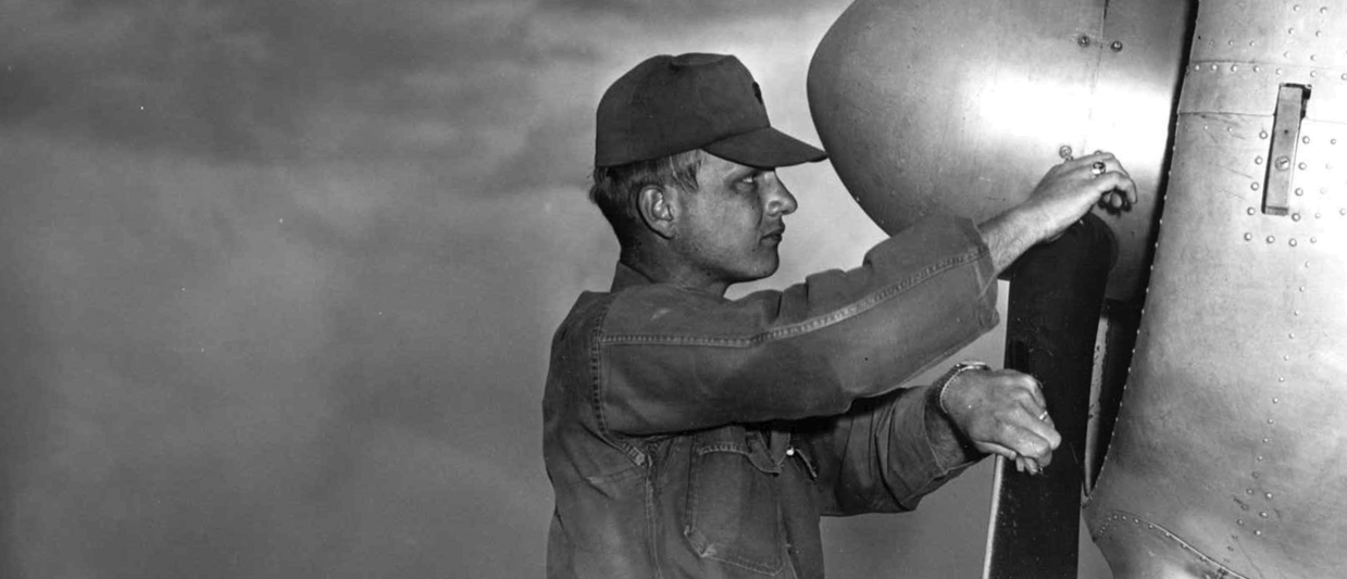 Merv Fleming works on airplane