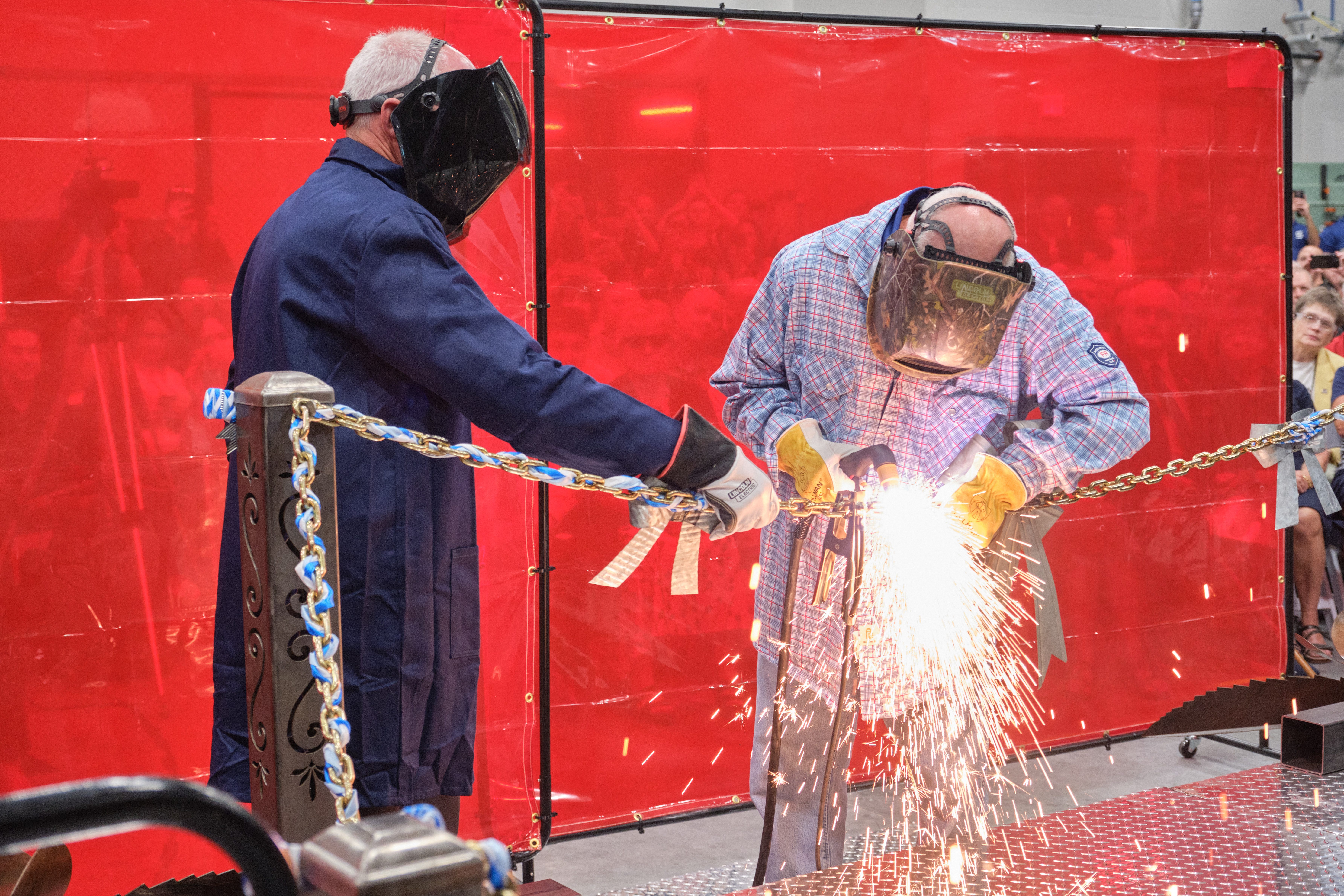 President Illich and Mark Hawkins, Welding Program Chair and Instructor, “cut” the ribbon in true welding style to officially open the new Welding Technology Center. President Illich and Mark Hawkins, Welding Program Chair and Instructor, “cut” the ribbon in true welding style to officially open the new Welding Technology Center.