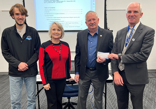 NPPD check presentation at 2023 Board of Governors December meeting. 